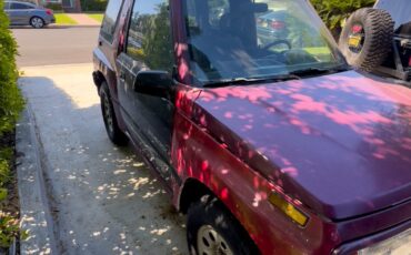 Suzuki-Sidekick-1995-SUV-3