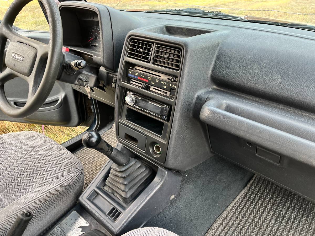 Suzuki-sidekick-1994-green-12