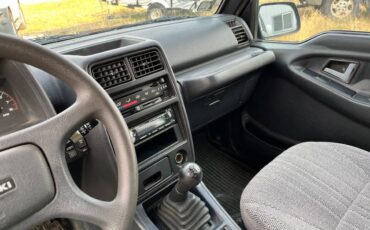 Suzuki-sidekick-1994-green-14