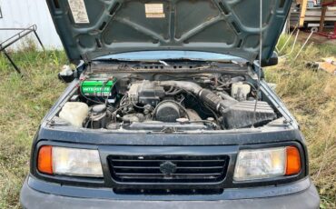 Suzuki-sidekick-1994-green-16