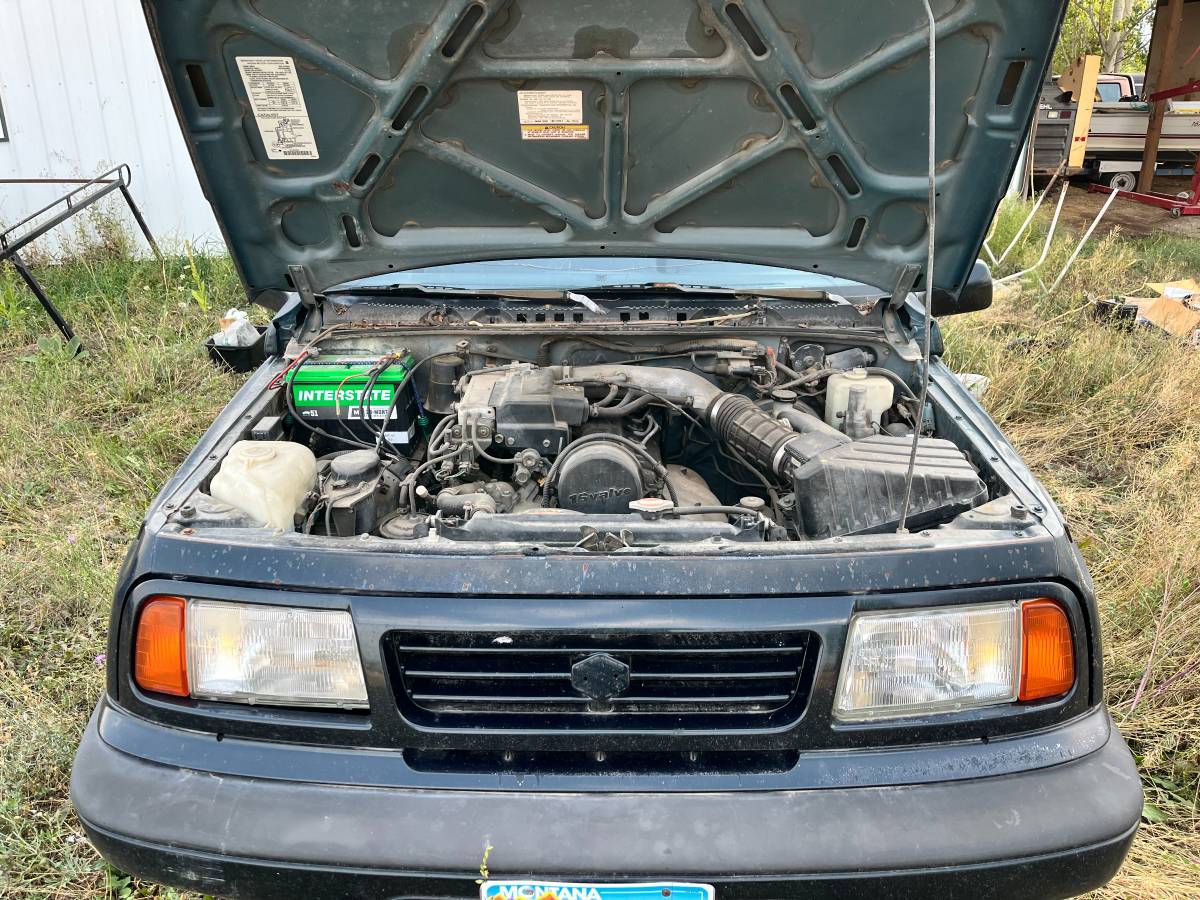 Suzuki-sidekick-1994-green-16