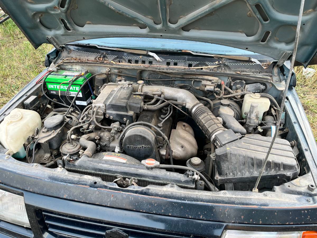 Suzuki-sidekick-1994-green-21