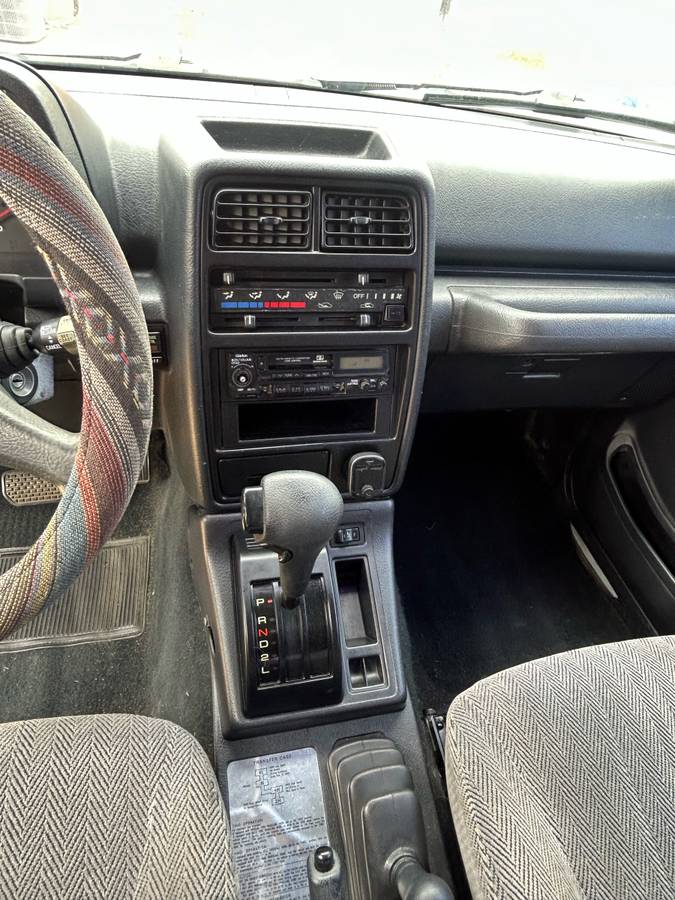 Suzuki-sidekick-1995-white-1