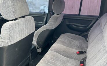 Suzuki-sidekick-1995-white-11