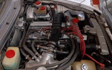 Alfa-romeo-spider-quadrifolgio-1987-silver-16