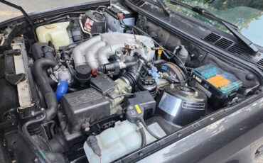 Bmw-320i-1988-black-10