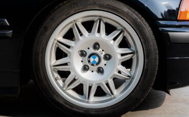 Bmw-325i-1994-black-13