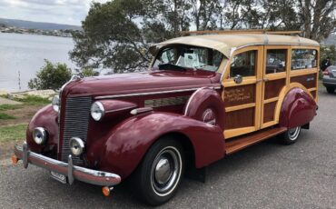 Buick-40-1937-Maroon-Cream-8