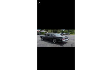 Buick-Lesabre-1976-Black-Maroon-5