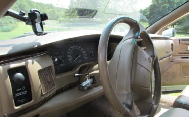 Buick-Roadmaster-1994-White-Woody-Saddle-19