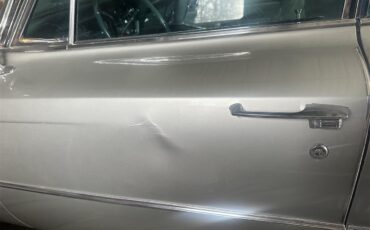 Cadillac-2-dr-sedan-1963-Silver-Green-1