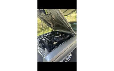 Cadillac-2-dr-sedan-1963-Silver-Green-12
