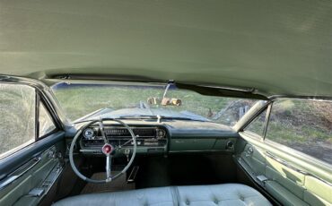 Cadillac-2-dr-sedan-1963-Silver-Green-13
