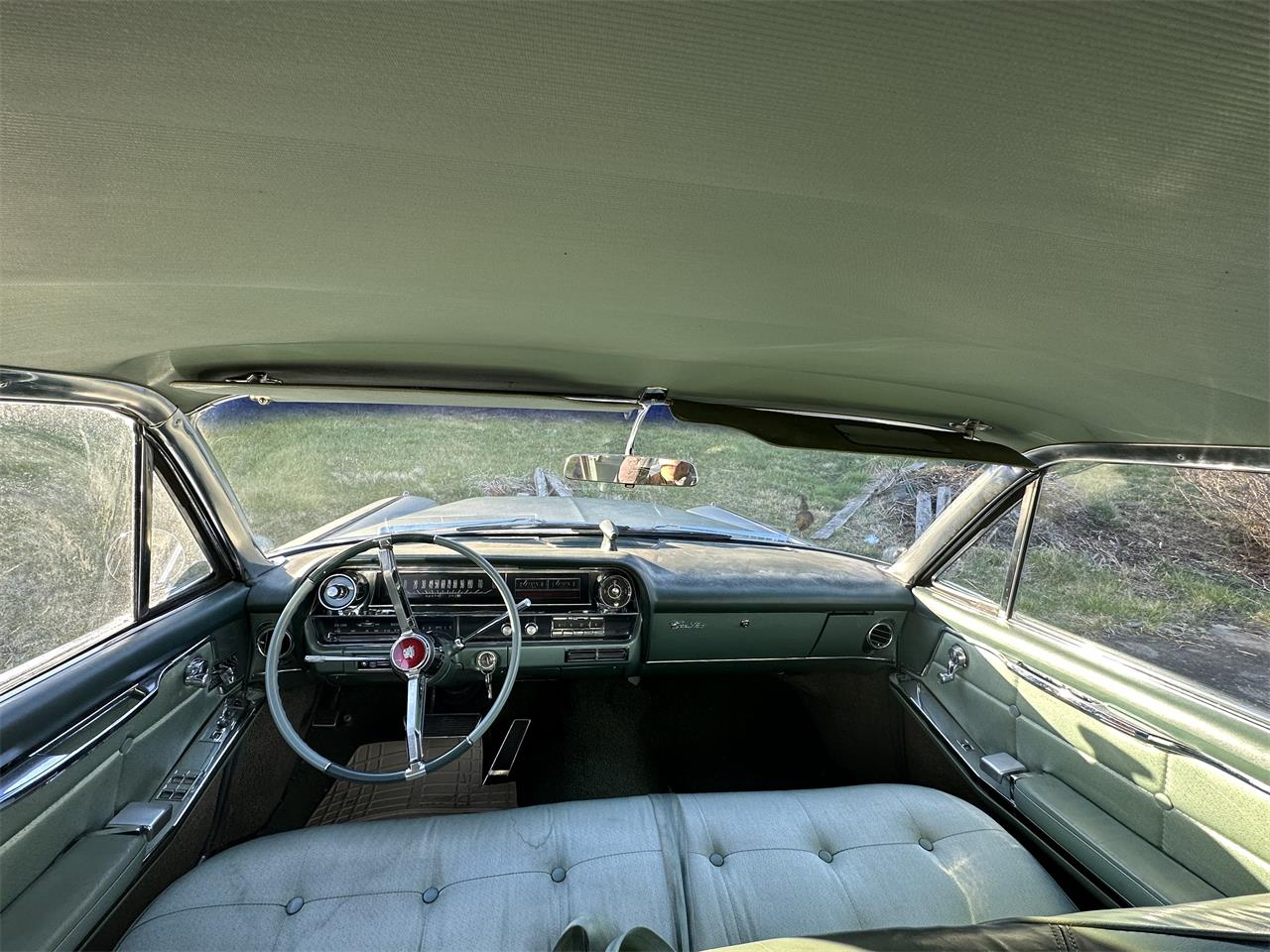 Cadillac-2-dr-sedan-1963-Silver-Green-13