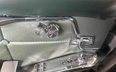 Cadillac-2-dr-sedan-1963-Silver-Green