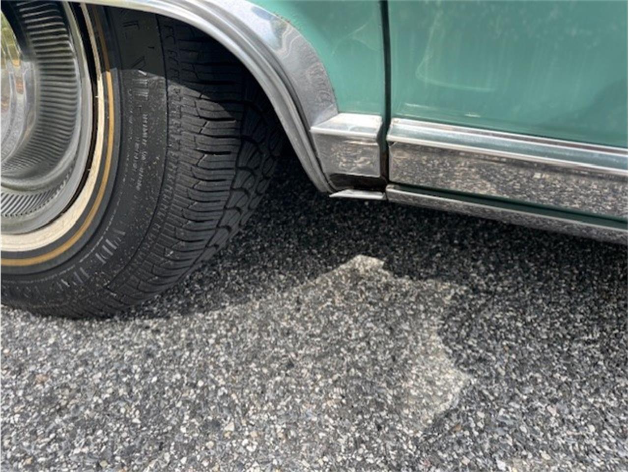 Cadillac-Coupe-deville-1975-Dunbarton-Green-Green-Plaid-38