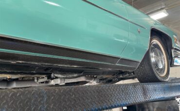 Cadillac-Coupe-deville-1975-Dunbarton-Green-Green-Plaid-48