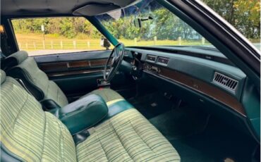 Cadillac-Coupe-deville-1975-Dunbarton-Green-Green-Plaid-5