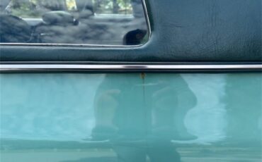 Cadillac-Coupe-deville-1975-Dunbarton-Green-Green-Plaid-62