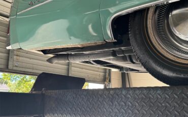 Cadillac-Coupe-deville-1975-Dunbarton-Green-Green-Plaid-9