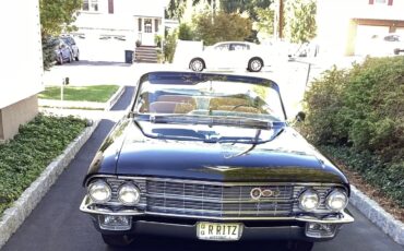 Cadillac-Eldorado-1962-Black-Saddle-Tan