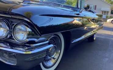 Cadillac-Eldorado-1962-Black-Saddle-Tan-4