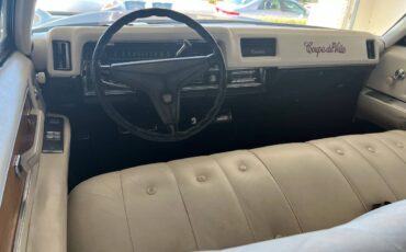 Cadillac-coupe-de-ville-1968-red-10