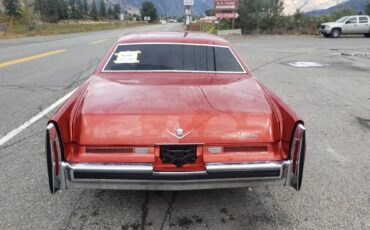 Cadillac-coupe-deville-1974-orange-1