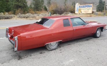 Cadillac-coupe-deville-1974-orange-2