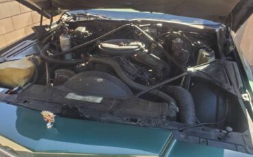Cadillac-coupe-deville-1978-green-10