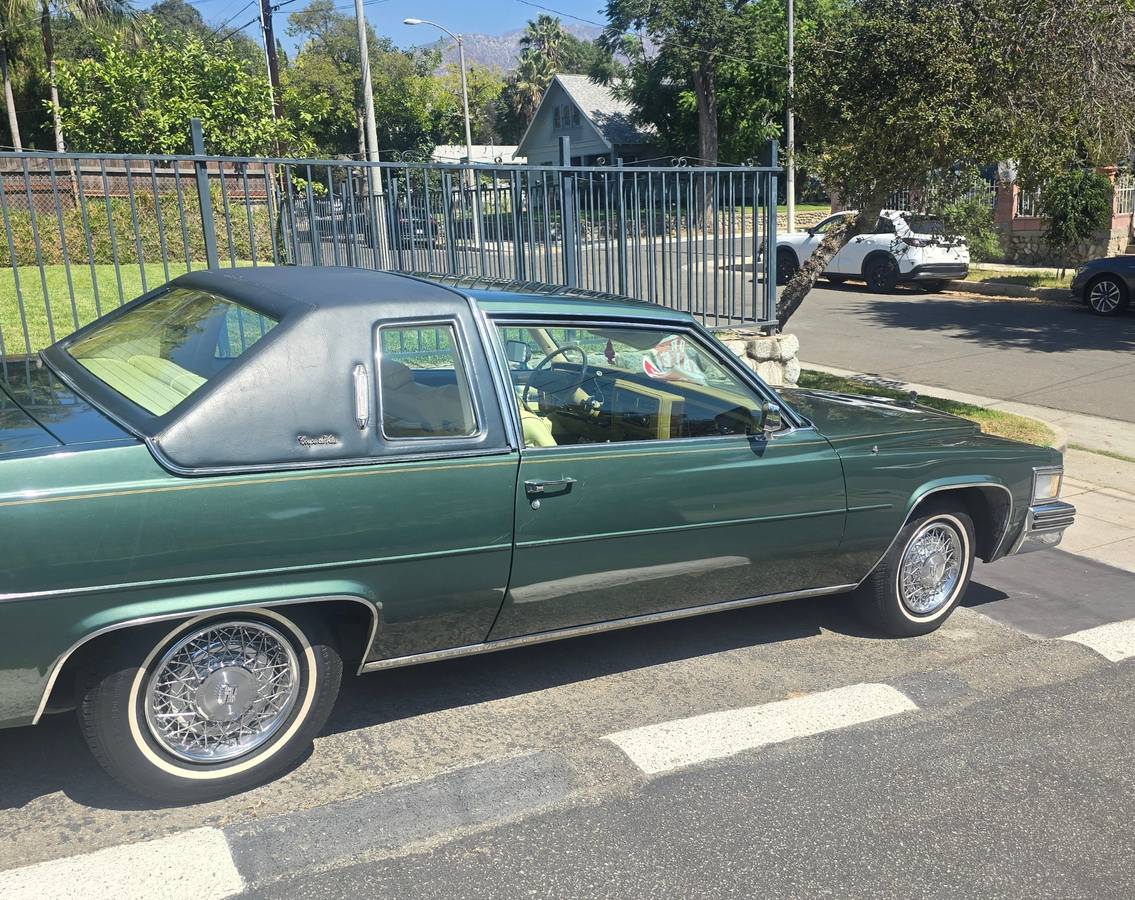 Cadillac-coupe-deville-1978-green-13