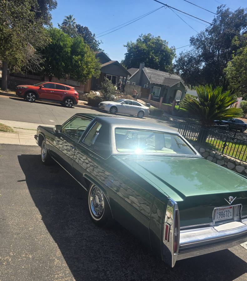 Cadillac-coupe-deville-1978-green-2