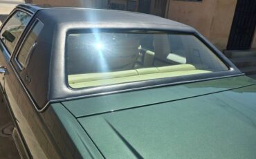 Cadillac-coupe-deville-1978-green-6
