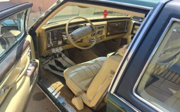 Cadillac-coupe-deville-1978-green-7