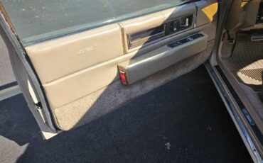 Cadillac-coupe-deville-1989-brown-9