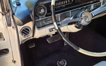 Cadillac-deville-convertible-1964-white-14