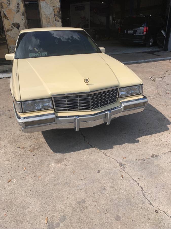 Cadillac-sedan-deville-1991-yellow-13