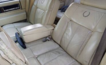 Cadillac-sedan-deville-1991-yellow