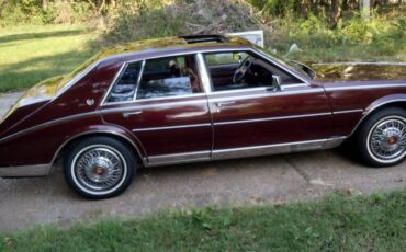 Cadillac-seville-1984-red
