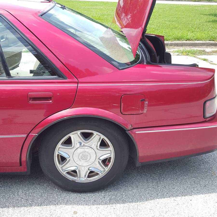 Cadillac-seville-sts-1996-red-11