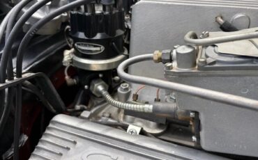 Chevrolet-Corvette-1957-Polo-White-Red-13