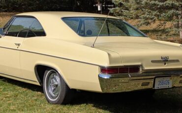 Chevrolet-impala-ss-1966-yellow-21