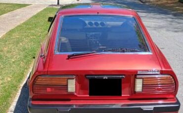 Datsun-280zx-1983-Candy-Apple-Red-Gray-Leather