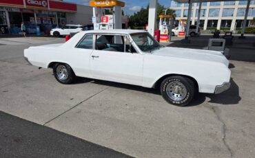 F85-cutlass-1964-1