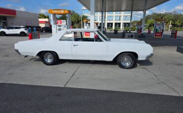 F85-cutlass-1964-2