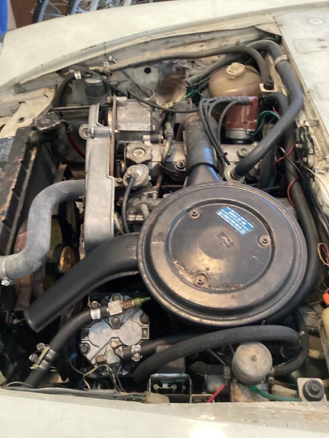 Fiat-124-spider-1974-white-9