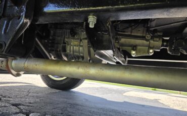 Ford-12-ton-pickup-1957-red-redtan-10