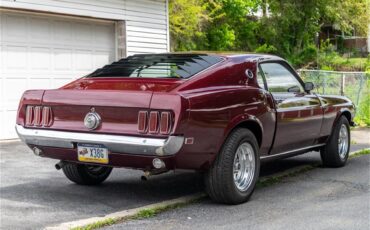 Ford-Mustang-1969-Toreador-Red-Red-CorinthianRed-Clarion-Knit