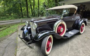 Ford-Roadster-1932-Maroon-With-Black-Fenders-Tan-Leather-11