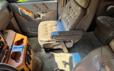 Ford-e150-conversion-van-1994-green-8